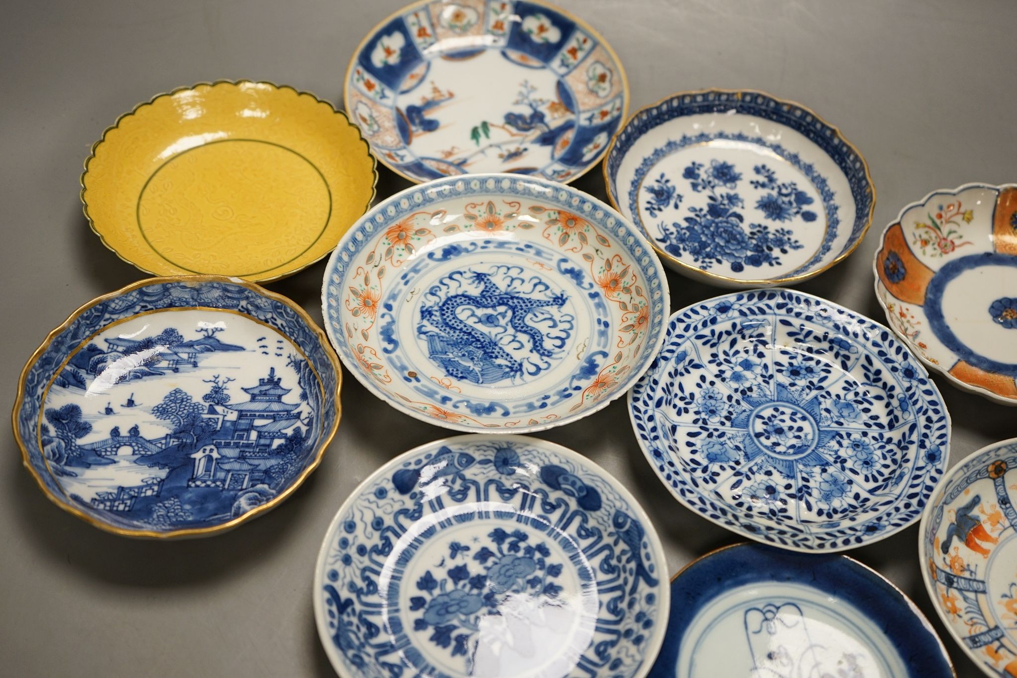 Ten various Chinese porcelain saucer dishes, largest 15cm